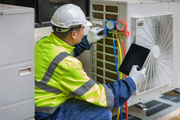 Professional Hvac technician working in Mansfield, PA
